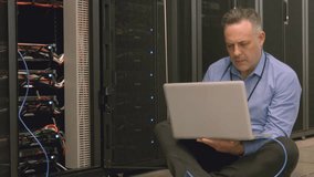 Animation of world map over caucasian businessman in server room. global business, technology and digital interface concept digitally generated video. - Powered by Shutterstock - Get 15% off with code: PIKWIZARD15