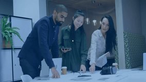 Team collaborating around conference table in tech office, overlaying network icons on schematics. Collaboration, innovation, teamwork, connectivity, modernity, productivity, technology - Powered by Shutterstock - Get 15% off with code: PIKWIZARD15