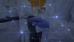 Animation of connections over diverse scientists. Global science, medicine, connections, computing and data processing concept digitally generated video. - Powered by Shutterstock - Get 15% off with code: PIKWIZARD15