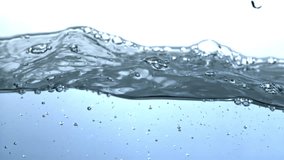 Super slow motion blue water waves with air bubbles . Filmed on a high-speed camera at 1000 fps. High quality FullHD footage - Powered by Shutterstock - Get 15% off with code: PIKWIZARD15