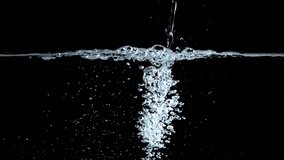Super slow motion water splashes with air bubbles . Filmed on a high-speed camera at 1000 fps. High quality FullHD footage - Powered by Shutterstock - Get 15% off with code: PIKWIZARD15