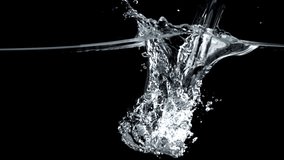 Super slow motion water splashes with air bubbles . Filmed on a high-speed camera at 1000 fps. High quality FullHD footage - Powered by Shutterstock - Get 15% off with code: PIKWIZARD15