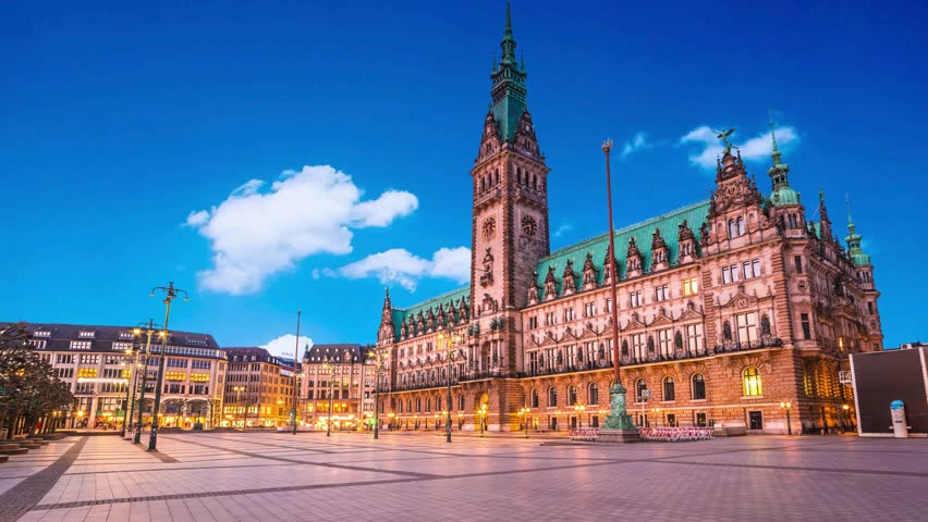 Panorama showing a building of the Hamburg City Hall timelapse, the seat of the government of Hamburg, located in the Altstadt quarter in the city center. View from the main square under a cloudy skyHamburg City Hall or Hamburger Rathaus is the seat of local government of Hamburg, Germanyalster, architecture, attraction, building, central, ,  hall, destination, downtown, economy, europe, european, famous, german, germany, government, governmental, hall, hamburg, hanse, hanseatic, historic, historical, history, house, kleine, landmark, neo renaissance, old, panorama, parliament, place, port, rathaus, seat, senate, sightseeing, sky, square, station, summer, tourism, tourist, tower, town, travel, urban, 