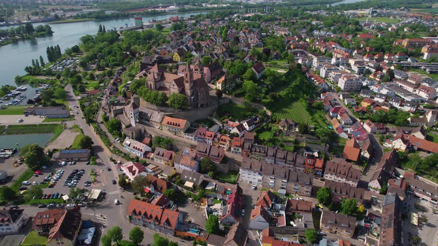 A Panoramic aerial view above the old town of the city Breisach am Kaiserstuhl in Germany on a sunny day in summer