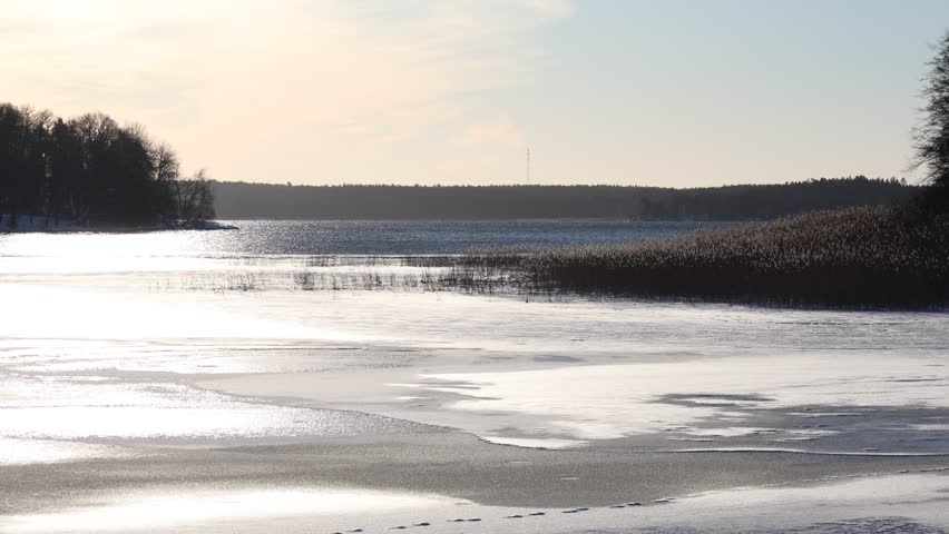 Video with snow and Mälaren lake. Winter day in Stockholm, Sweden. January 2026. 