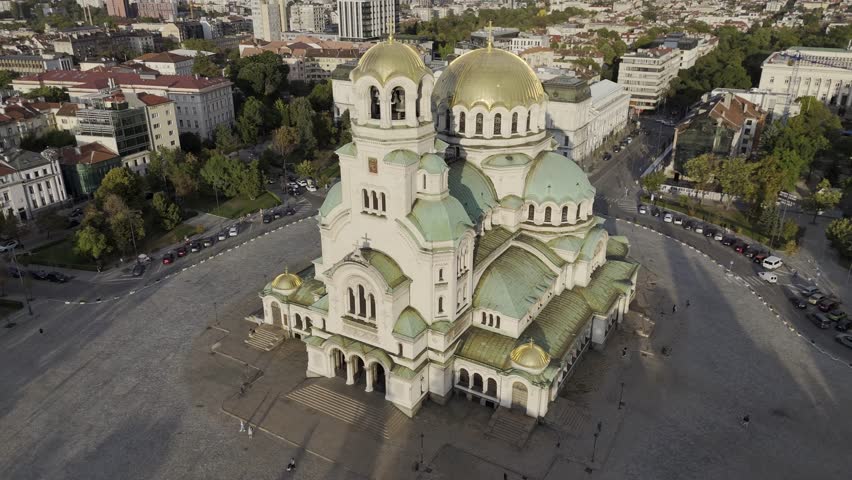 Aerial view of Alexander Nevsky Cathedral in Sofia Bulgaria. 
High quality drone footage of the iconic Orthodox church with golden domes and historic architecture in the city center.