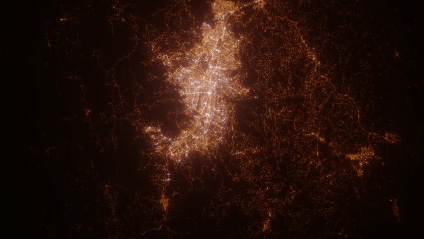 Medellin (Colombia) aerial view at night. Satellite view on modern city with street lights. Camera is flying above the city, moving forward