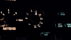 Illuminated dashboard in a modern aircraft cockpit showing cabin pressure indicator - Powered by Shutterstock - Get 15% off with code: PIKWIZARD15