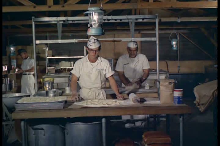 1960s - Chefs cook in a mess tent during the Vietnam War in the 1960s.