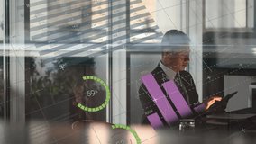 Animation of infographic interface over businessman using digital tablet in office. Digital composite, multiple exposure, global, report, database, business and technology concept. - Powered by Shutterstock - Get 15% off with code: PIKWIZARD15