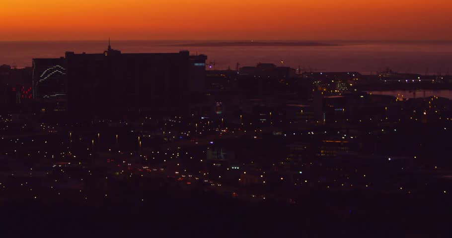 Cityscape at dusk with social media notifications animation over buildings and lights. Urban, skyline, metropolitan, evening, twilight, digital