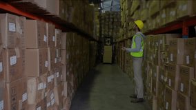 Warehouse worker pausing tablet showing icons, scanning boxes for inspection while forklift nearing. Logistics, inventory, digitalization, automation, industrial, warehouse, technology - Powered by Shutterstock - Get 15% off with code: PIKWIZARD15