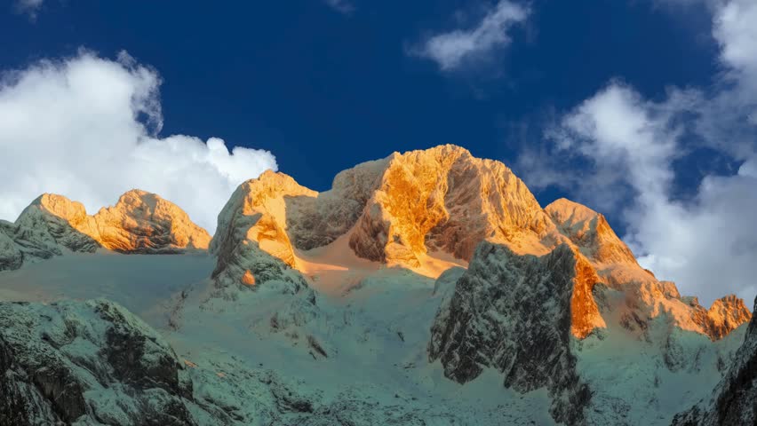 Beautiful vibrant sunrise sky over Reine town with fishing village and snow covered mountain in winter at Lofoten Islands, Norway A serene, snow-blanketed mountainous terrain bathed in sunlight, with clear blue skies above and rugged peaks in the distance, suggesting a remote alpine region. Beautiful sunrise colours in the Alps in winter

orange, tree, vacation, sunlight, colorful, dawn, season, summit, dolomites, hill, summer, mountains, morning, sun, europe, landscape, peak, high, beautiful, alpine, background, blue, nature, sky, scenery, snow, panorama, white, view, mountain, cold, winter, sunrise, forest, scenic, travel, sunset, outdoor, hiking, top, rock, clouds, ice, tourism, alps