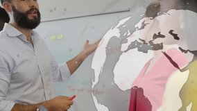 Animation of data processing and globe over diverse businesspeople talking in office. Business, cooperation, network, communication and technology concept digitally generated video. - Powered by Shutterstock - Get 15% off with code: PIKWIZARD15