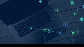 Animation of computer icons interconnecting with lines and graphs over laptop on table. Digital composite, multiple exposure, investment, infographic, futuristic and technology concept. - Powered by Shutterstock - Get 15% off with code: PIKWIZARD15