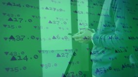 Animation of stock market over caucasian businessman using smartphone. Global business, finances and digital interface concept digitally generated video. - Powered by Shutterstock - Get 15% off with code: PIKWIZARD15