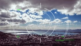 Animation of glitch technique and circles, aerial view of city, mountain and sea against cloudy sky. Digital composite, multiple exposure, shape, architecture, drone and technology concept. - Powered by Shutterstock - Get 15% off with code: PIKWIZARD15
