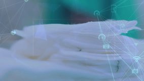 Animation of media icons over diverse doctors during surgery. Global medicine and digital interface concept digitally generated video. - Powered by Shutterstock - Get 15% off with code: PIKWIZARD15