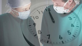 Animation of ticking clock against caucasian male and female surgeons discussing at hospital. Medical healthcare technology concept - Powered by Shutterstock - Get 15% off with code: PIKWIZARD15