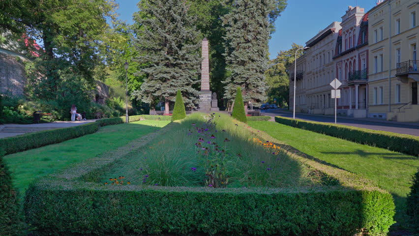 Monument to Russian Field Marshal Mikhail Kutuzov in Boleslawiec, Poland. Historic memorial at the site of his death in 1813, surrounded by a park and traditional architecture in Lower Silesia.
