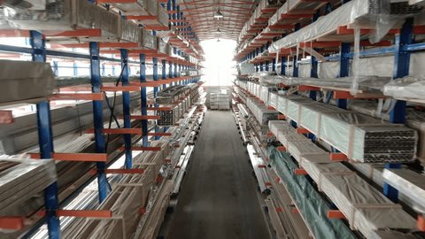 Backward Drone Flight through Aluminum Storage Racks