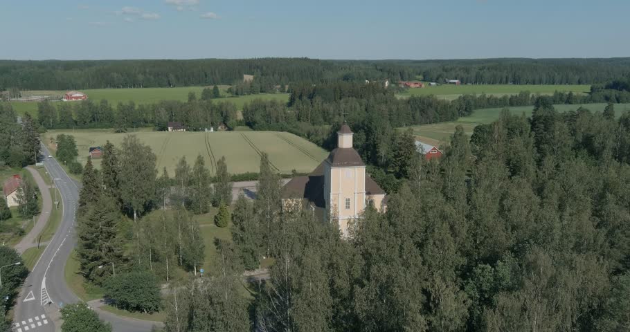 Aerial view of Hausjärvi church and surroundings in sunny summer weather, Hausjärvi, Finland.