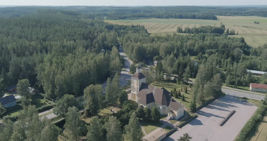 Aerial view of Hausjärvi church and surroundings in sunny summer weather, Hausjärvi, Finland.
