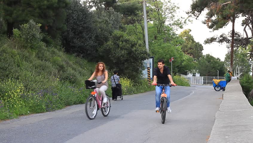 ISTANBUL - MAY 2: Young couple cycle in nature at Heybeli Ada Island on May 2,