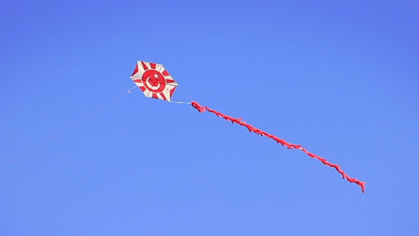 Turkish flag kite against clear blue sky
