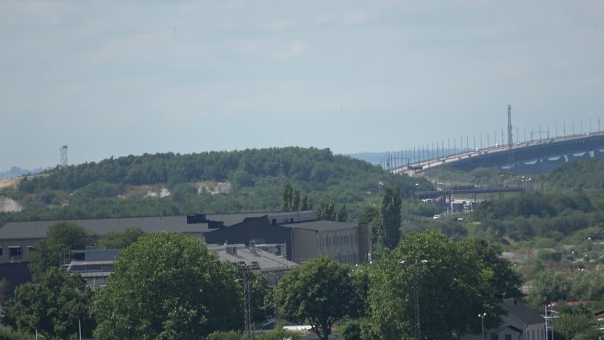 MALMO SWEDEN July 5 2024 Öresund Bridge connects Malmö, Sweden and Copenhagen, Denmark. Photo taken in Hyllie, Malmö. The bridge for cars and trains is 7.8 km long and was completed 200. 