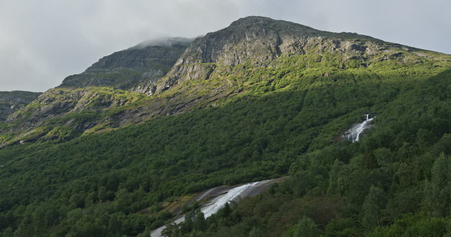 Dramatic norwegian mountain landscape with waterfalls