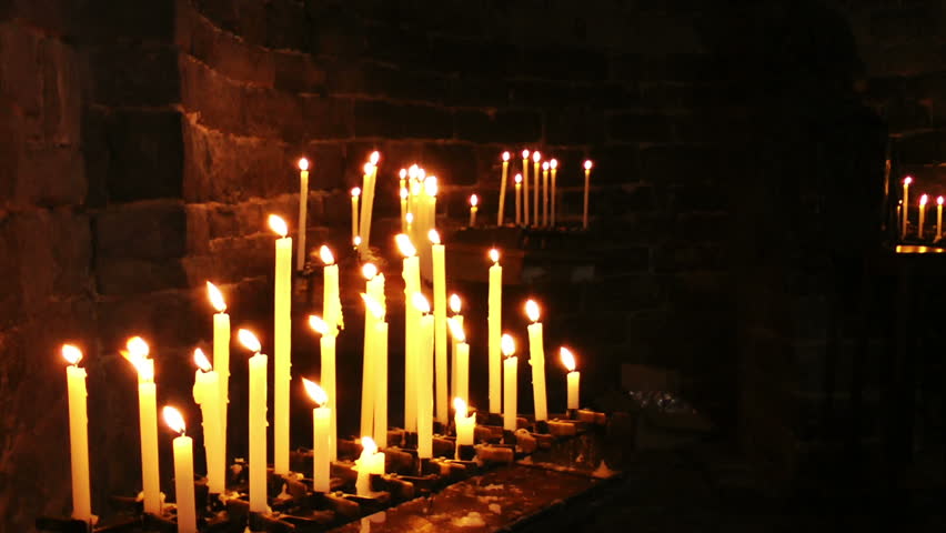 Burning candles in the Church of Saint Peter, Portovenere