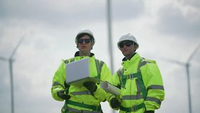 Engineers working on site in wind turbine farm, Wind turbines generate clean energy source, Eco technology for electric, industry environment, sustainable technology wind power maintenance. - Powered by Shutterstock - Get 15% off with code: PIKWIZARD15