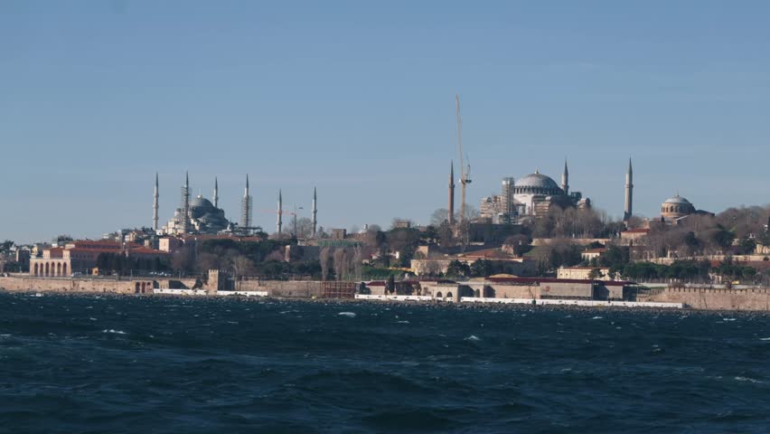 View of Topkapi Palace, Suleymaniye Mosque and Eminönü from the sea in Istanbul.