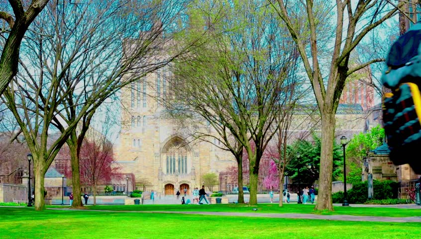 Sterling Memorial Library and there are students.