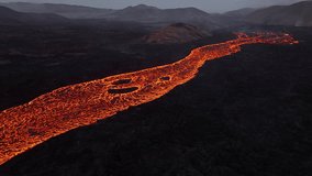 Hot Molten Lava Flowing Across Volcanic Terrain - Powered by Shutterstock - Get 15% off with code: PIKWIZARD15