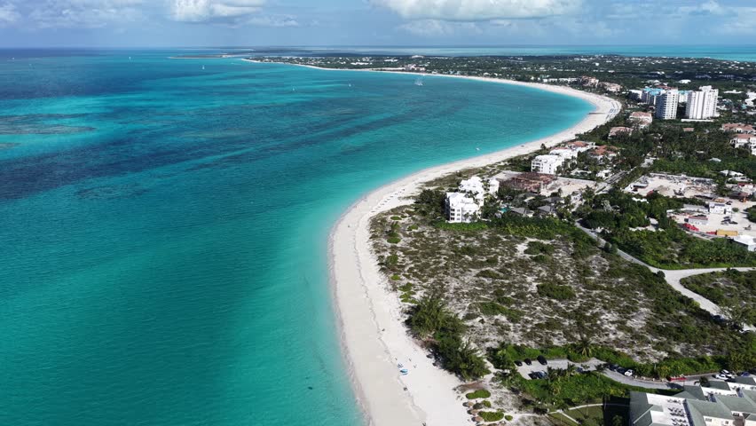 Grace Bay At Providenciales In Overseas Territory United Kingdom. Beach Landscape. Bay Harbor Scenery. Downtown District. Grace Bay In Providenciales United Kingdom. Amazing Caribbean Sea.