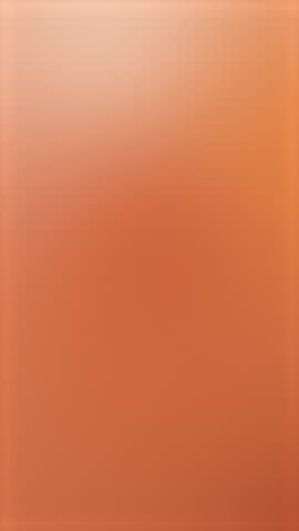 Smooth vertical gradient background with warm brown and soft orange tones in abstract animated motion. Minimal modern backdrop for social media, stories, presentations, and digital design