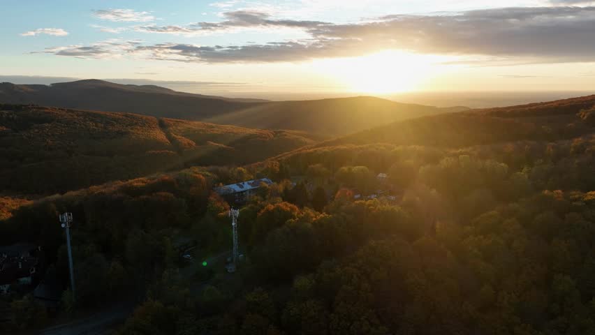 Flying over f autum hills of Slovakia at sunrise, Pezinska Baba
