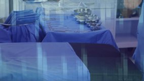 Animation of data processing over caucasian female surgeon. Global medicine, computing, connections, networks and data processing concept digitally generated video. - Powered by Shutterstock - Get 15% off with code: PIKWIZARD15