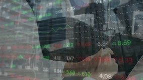 Animation of financial data processing over caucasian businessman using tablet in office. Global business, finance and data processing concept digitally generated video. - Powered by Shutterstock - Get 15% off with code: PIKWIZARD15