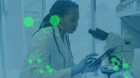 Animation of data processing over african american female scientist in lab. Global science and digital interface concept digitally generated video. - Powered by Shutterstock - Get 15% off with code: PIKWIZARD15