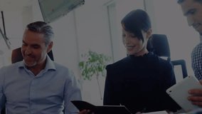 Animation of stock market data processing over diverse businesspeople discussing together at office. Global economy and business technology concept - Powered by Shutterstock - Get 15% off with code: PIKWIZARD15