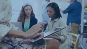 Business executives are using mobile phones, digital tablets and laptops at the office to stay connected and up-to-date on the latest news and developments in their industry. Social media and - Powered by Shutterstock - Get 15% off with code: PIKWIZARD15