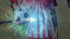 Soccer player holding ball with digital cloud and data processing animation overlay. Sports, technology, analytics, innovation, athlete, competition - Powered by Shutterstock - Get 15% off with code: PIKWIZARD15