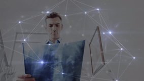 Animation of data processing over caucasian male doctor. Global medicine and digital interface concept digitally generated video. - Powered by Shutterstock - Get 15% off with code: PIKWIZARD15