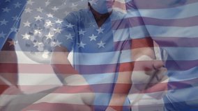 Animation of waving usa flag against team of diverse surgeons performing operation at hospital. Global medical healthcare concept - Powered by Shutterstock - Get 15% off with code: PIKWIZARD15