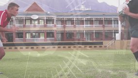 Ball-carrier entering frame holding rugby ball, defender lunging to tackle, overlay tracking tackle. Athletes, competition, intensity, sport, teamwork, action, aggressive - Powered by Shutterstock - Get 15% off with code: PIKWIZARD15