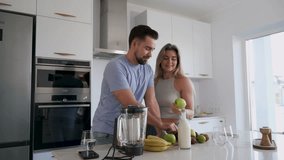  Couple Preparing Healthy Smoothie Together in Bright Modern Kitchen - Powered by Shutterstock - Get 15% off with code: PIKWIZARD15
