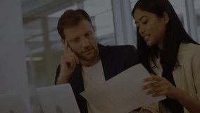 Animation of financial data processing over diverse business people using tablet in office. Global connections, business, finance, computing and data processing concept digitally generated video. - Powered by Shutterstock - Get 15% off with code: PIKWIZARD15